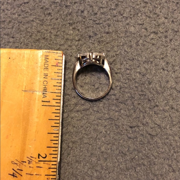 CZ 5 stone ring with silver tone mounting. - Picture 3 of 6